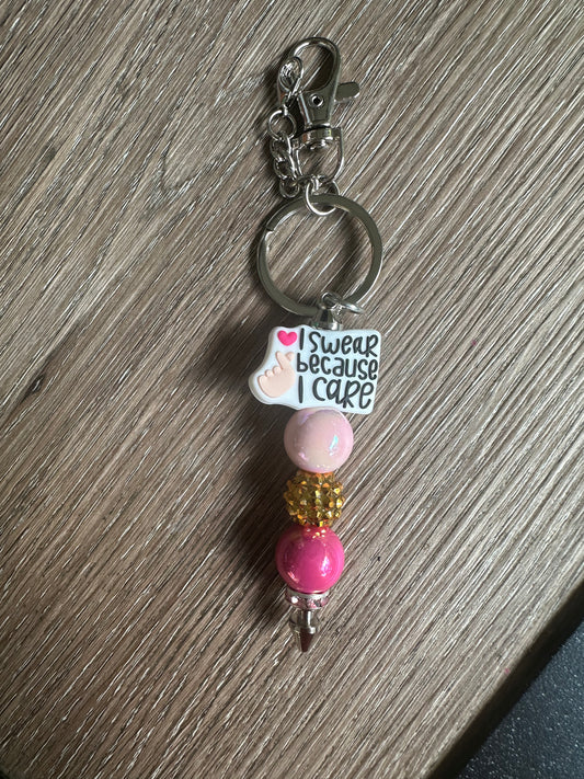 I Swear Because I Care Keychain