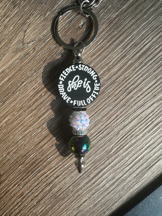 She is... Keychain
